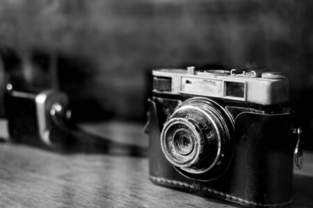 Collectibles Classic and old film camera. retro technology. vintage color tone.の写真素材