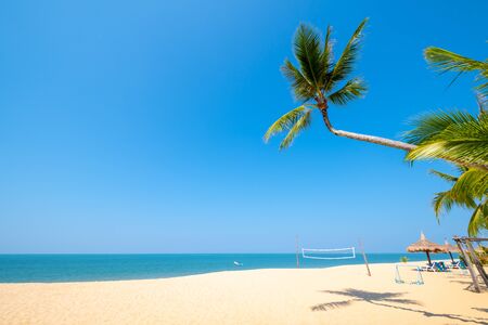 Beautiful tranquil scenery of tropical landscape sea view and palm tree on sand beach. Travel inspirational, Summer holiday and vacation concept for tourism relaxing.の写真素材