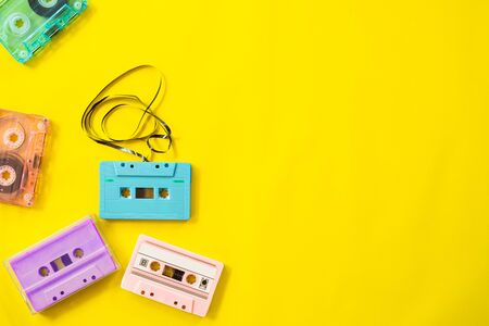 Retro cassette tape recorder on yellow background, flat lay, top view. retro technologyの写真素材