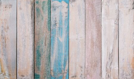 Vintage wood background - Wooden panel with beautiful patterns. old weathered wooden plank painted in color.の写真素材