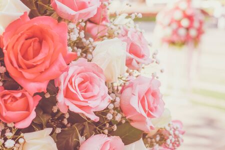 Rose bouquet in wedding day, love and romantic background. Pink rose flower blossom in vintage pastel color. flowers in spring.の写真素材