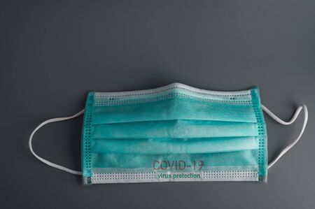 Virus and bacteria prevention. Hygienic mask to prevent pathogens from secretions. Corona virus spread protection. for medical surgical or travel.の写真素材