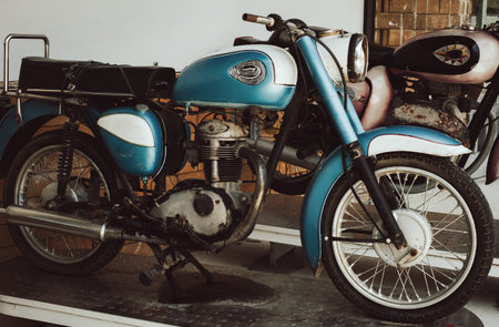 Vintage and Classic motorcycle parked in garage. Retro color tone effect.