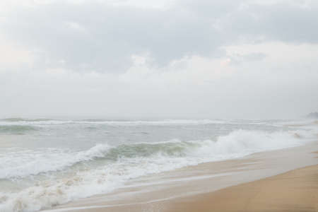 Seascape abstract beach background with misty. sea surf with fog. Image soft look with smooth technique.の写真素材