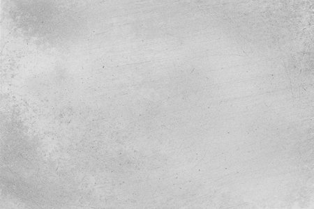 Abstract grunge texture effect, scratch and dust particle grain on white background. Dirt overlay or screen effect use for grunge and vintage image styleの写真素材