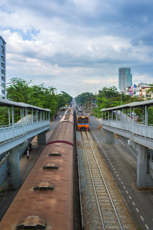 Trains, one type of transportation in Thailand.