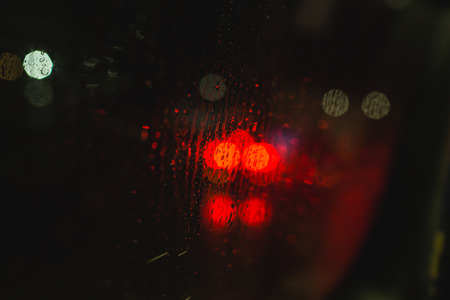 Abstract background from lights and rain.の写真素材