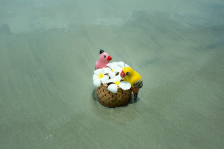Ceramics birds on the beach.の写真素材