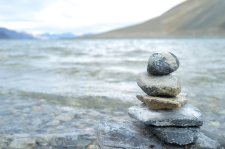 Stacked stones in Pangong lake, Leh Ladakh, Jammu and Kashmir, Indiaの写真素材