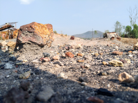 The big rock is above the ground caused by weathering at abandoned areaの写真素材
