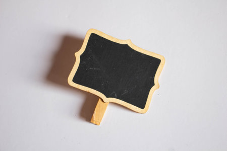Blank blackboard with wooden frame on white background, stock photoの写真素材