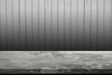 Concrete floor or table empty on a white wood background. Concept to place products such as cement, steel, or other construction related products. Or Place food-related items such as meat, vegetables.の写真素材