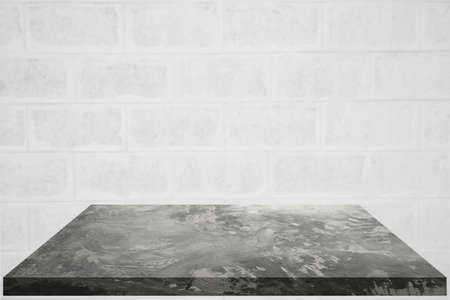 Concrete table empty on the cement wall background. Concept to place products such as cement, steel, or other construction-related products. Or Place food-related items such as meat, vegetables.の写真素材
