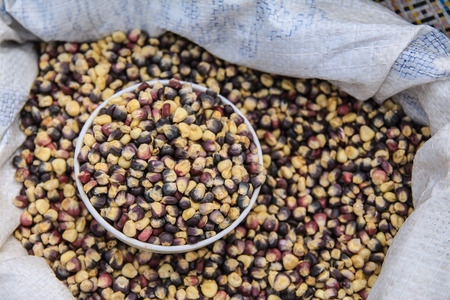 A cup of violet corn seed の写真素材