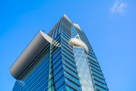 Modern office building on the blue sky