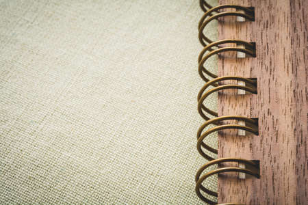 Spiral notebook on the canvas background, vintage colorの写真素材