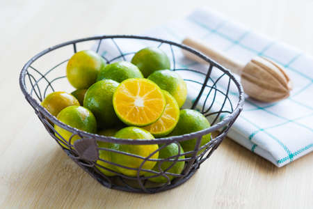 Fresh oranges in a basketの写真素材
