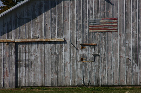 Flag on Faded Barn in Nebraskaの写真素材