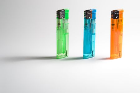 3 colored lighters, standing.の写真素材