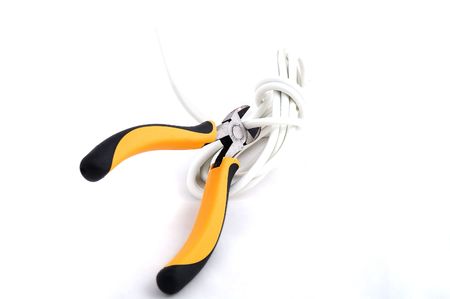 Wrench on white wire, isolated.の写真素材