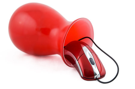 Computer mouse coming out of a red vase