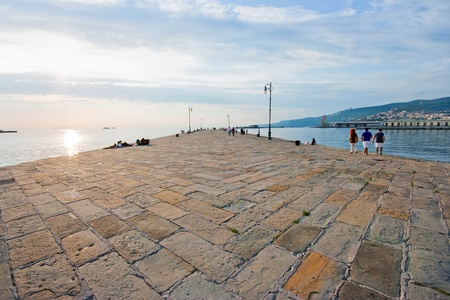 pier at dawn as seen in trieste, italy.の写真素材