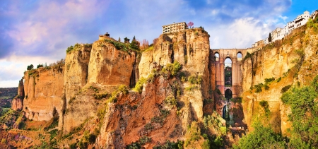 Panoramic view of the old city of Ronda, one of the famous white villages, at sunset in the province of Málaga, Andalusia, Spainの写真素材