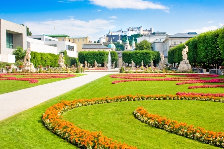 Famous Mirabell Gardens with the old historic Fortress Hohensalzburg in the background in Salzburg, Austriaのeditorial素材