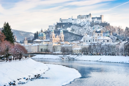 Salzburg skyline with Festung Hohensalzburg and river Salzach in winter, Salzburger Land, Austriaの写真素材