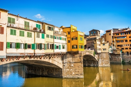 Ponte Vecchio with river Arno at sunset in Florence, Italyの写真素材