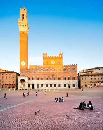 Beautiful view of famous Piazza del Campo with Torre del Mangia at sunset in Siena, Tuscany, Italyのeditorial素材