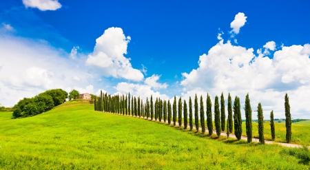 Beautiful landscape with house on hill in Val d Orcia, Tuscany, Italyの写真素材