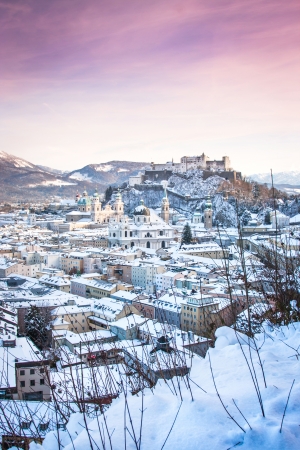 Beautiful view of the historic city of Salzburg with Festung Hohensalzburg in winter, Salzburger Land, Austriaの写真素材