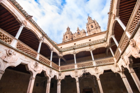 Famous Patio de la Casa de las Conchas with La Clerecia Church in Salamanca, Castilla y Leon, Spainのeditorial素材