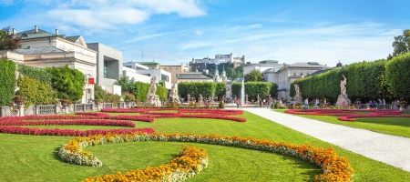Panoramic view of famous Mirabell Gardens with the old historic Fortress Hohensalzburg in the background in Salzburg, Austriaのeditorial素材