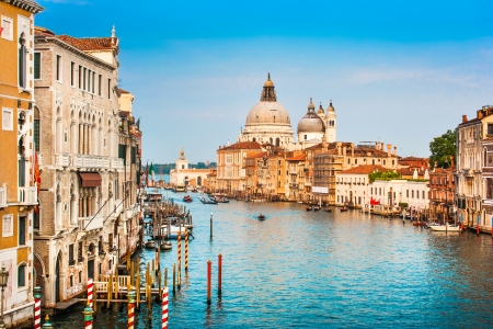 Beautiful view of famous Canal Grande and Basilica di Santa Maria della Salute at sunset in Venice, Italyの写真素材