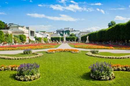Beautiful view of famous Mirabell Gardens with the old historic Fortress Hohensalzburg in the background in Salzburg, Austriaのeditorial素材