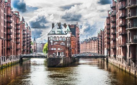Famous Speicherstadt warehouse district with dramatic clouds before the storm in Hamburg, Germanyの写真素材