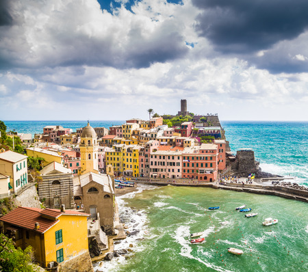 Beautiful view of Vernazza, one of the five famous fisherman villages of Cinque Terre with dramatic cloudscape in Liguria, Italyの写真素材
