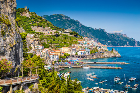 Scenic picture-postcard view of the beautiful town of Amalfi at famous Amalfi Coast with Gulf of Salerno, Campania, Italy