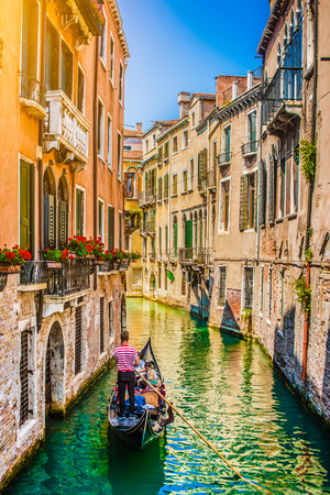 Beautiful scene with traditional gondola and canal in Venice, Italyの写真素材
