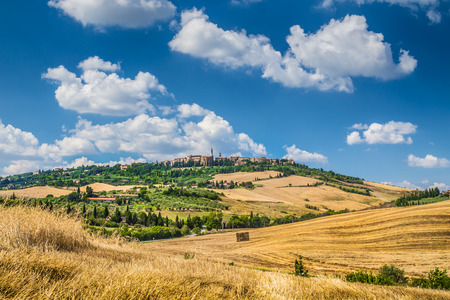 Beautiful Tuscany landscape with the old town of Pienza on a hill in summertime, Val d Orcia, Tuscany, Italyの写真素材