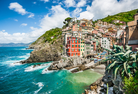 Panoramic view of Riomaggiore, one of the five famous fisherman villages of Cinque Terre in Liguria, Italyの写真素材