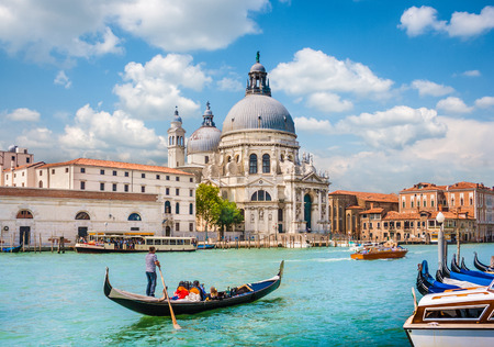 Traditional Gondola on Canal Grande with Basilica di Santa Maria della Salute in the background, Venice, Italyの写真素材