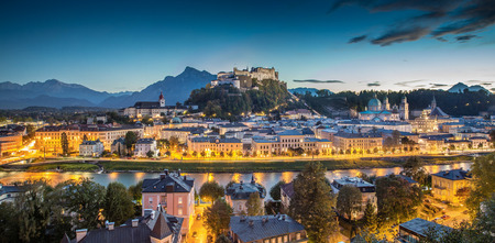 Panoramic view of the historic city of Salzburg with Hohensalzburg Fortress at dusk, Salzburger Land, Austriaの写真素材
