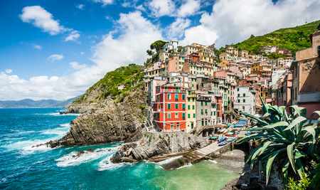 Panoramic view of Riomaggiore, one of the five famous fisherman villages of Cinque Terre in Liguria, Italyの写真素材