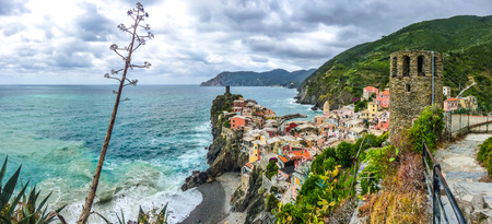 Beautiful view of Vernazza, one of the five famous fisherman villages of Cinque Terre with dramatic cloudscape in Liguria, Italyの写真素材