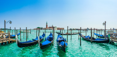 Beautiful view of traditional Gondolas on Canal Grande with San Giorgio Maggiore church in the background, San Marco, Venice, Italyの写真素材