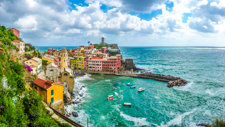 Beautiful view of Vernazza, one of the five famous fisherman villages of Cinque Terre with dramatic cloudscape in Liguria, Italyの写真素材