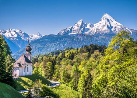 Beautiful mountain landscape in the Bavarian Alps with pilgrimage church of Maria Gern and Watzmann massif in the background, Nationalpark Berchtesgadener Land, Bavaria, Germanyの写真素材